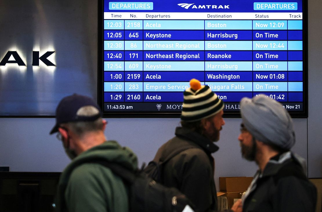 Travelers line up to board Amtrak trains inside the Daniel Patrick Moynihan Train Hall at Pennsylvania Station ahead of the Thanksgiving holiday in Manhattan in New York City, New York, U.S., November 21, 2023.