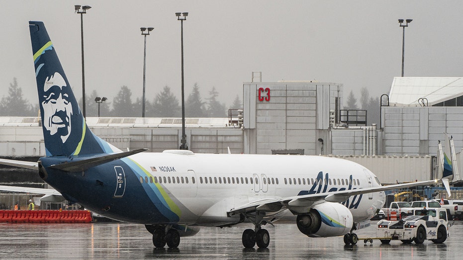 Alaska Airlines Boeing 737-900ER on tarmac at SeaTac